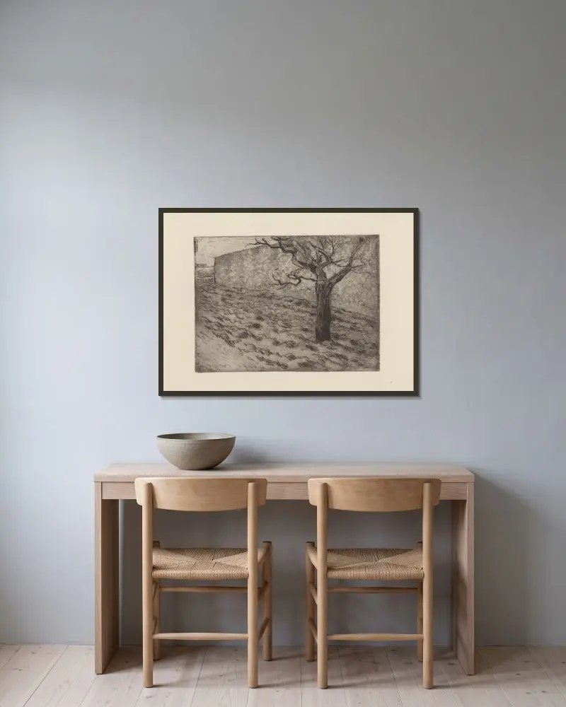 Baum und gepflügtes Feld von Camille Pissarro gerahmt an einer Wand