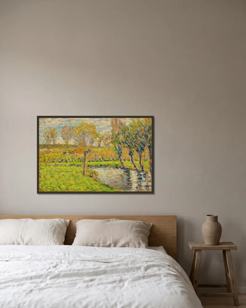Das Ufer der Epte bei Éragny von Camille Pissarro gerahmt an einer Wand