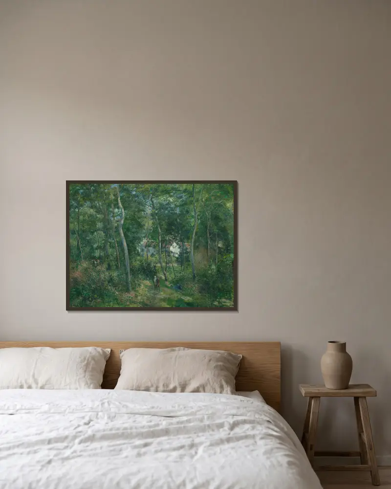 Edge of the Woods Near L’Hermitage, Pontoise av Camille Pissarro inramad på en vägg