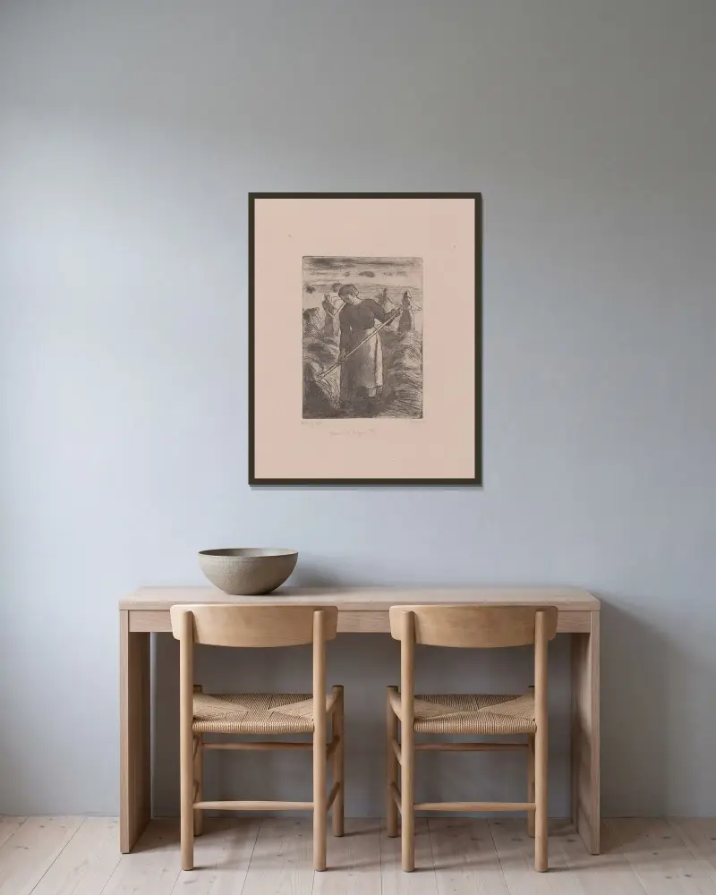Höräfserskor i Éragny av Camille Pissarro inramad på en vägg