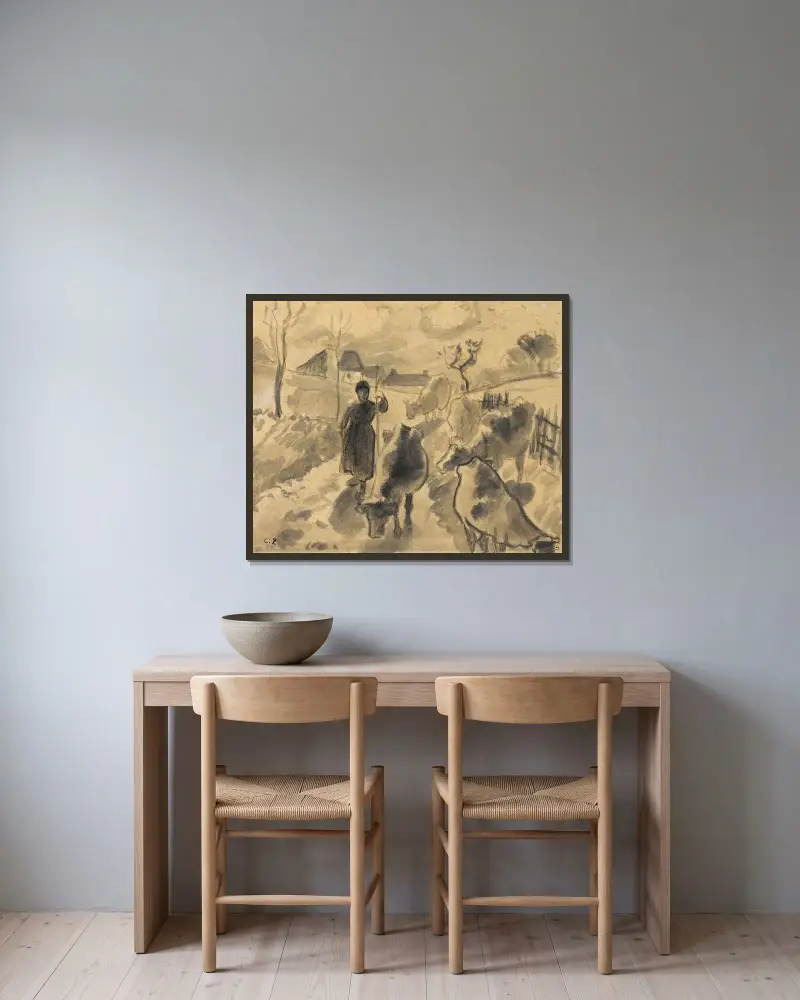Flicka driver en hjord kor längs en väg av Camille Pissarro inramad på en vägg