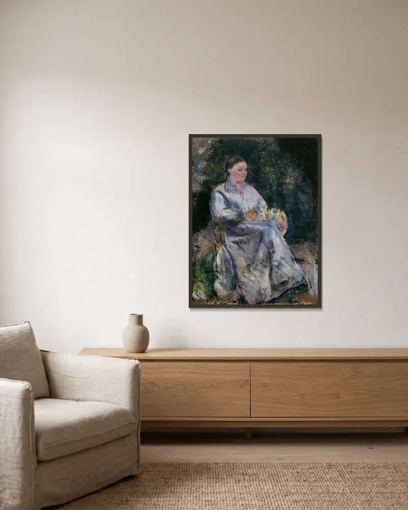 Julie Pissarro i trädgården av Camille Pissarro inramad på en vägg