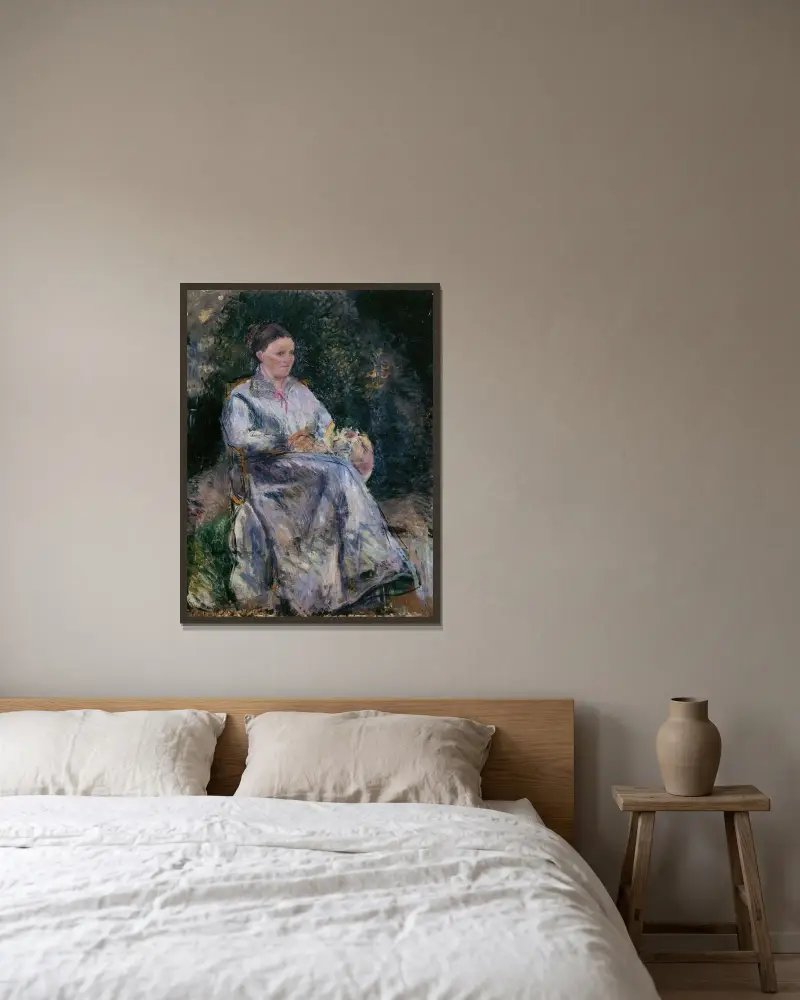 Julie Pissarro i trädgården av Camille Pissarro inramad på en vägg