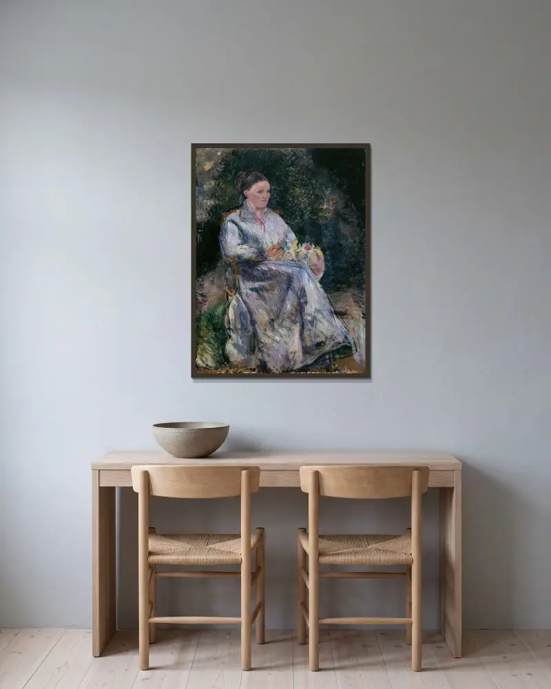 Julie Pissarro i trädgården av Camille Pissarro inramad på en vägg
