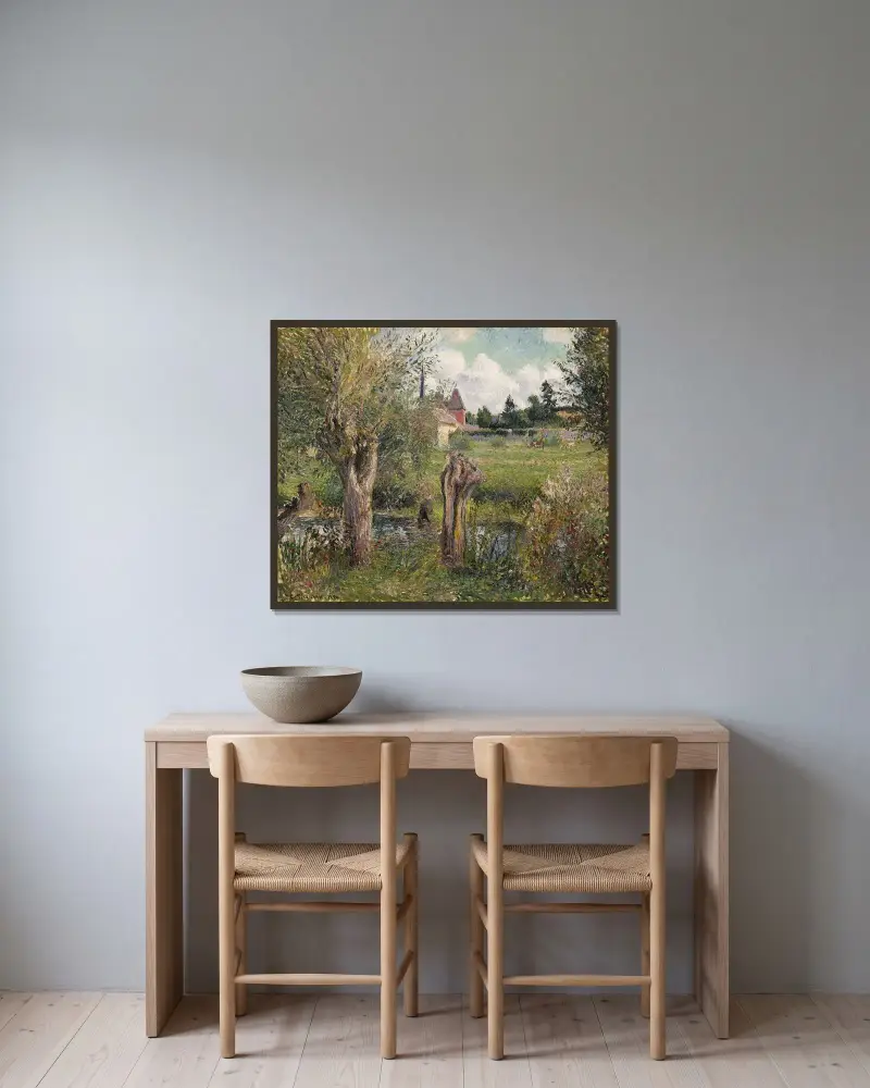 Die Ufer der Epte bei Éragny von Camille Pissarro gerahmt an einer Wand