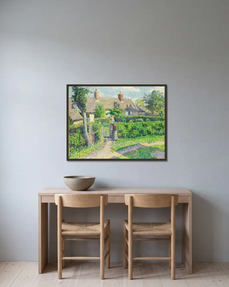 Peasants’ houses, Eragny av Camille Pissarro inramad på en vägg