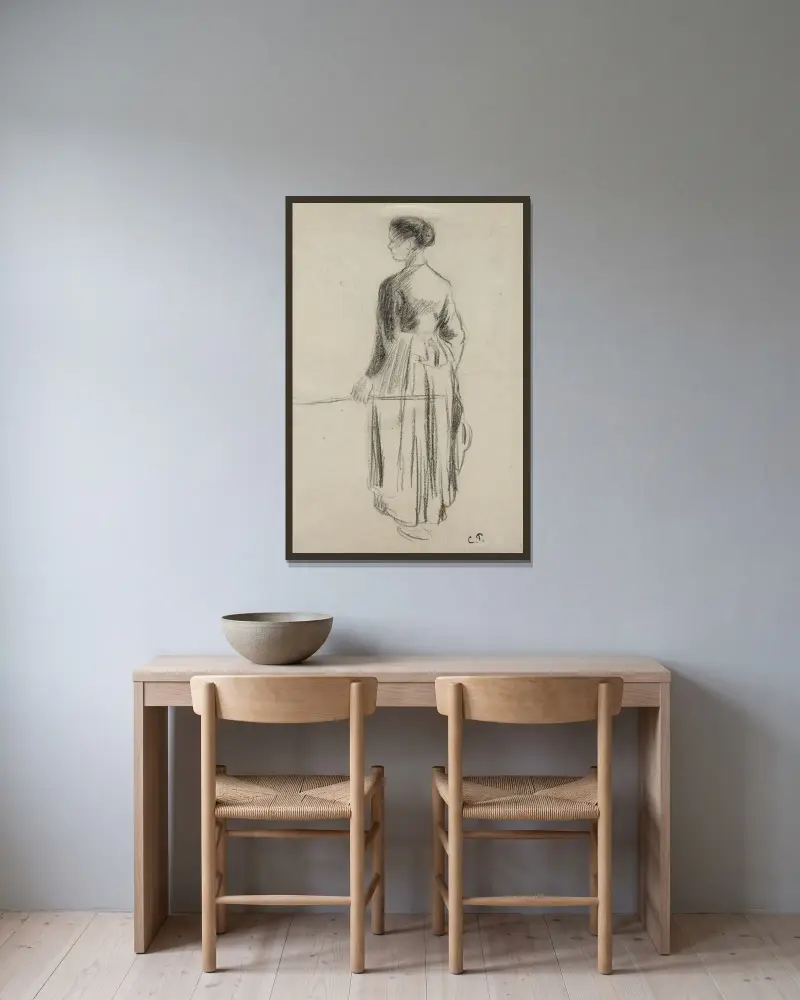 Koherdinnan, Eragny av Camille Pissarro inramad på en vägg