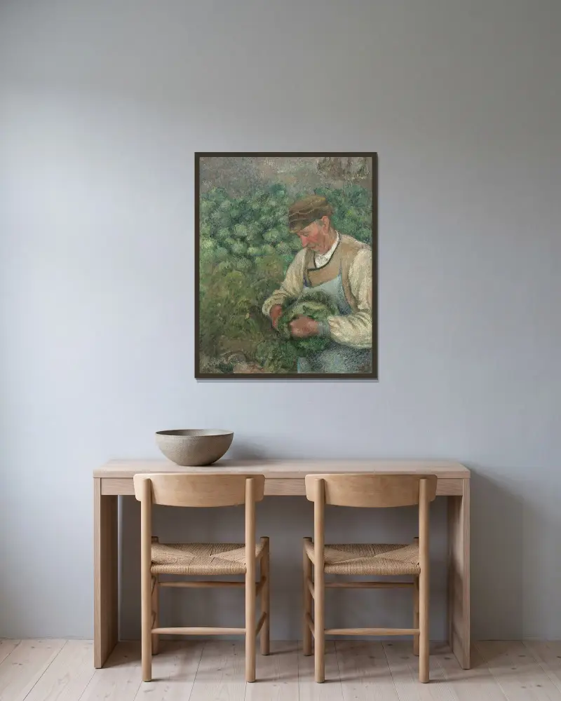 Trädgårdsmästaren – gammal bonde med kål av Camille Pissarro inramad på en vägg