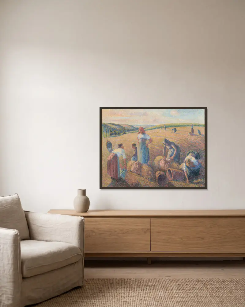The Gleaners av Camille Pissarro inramad på en vägg