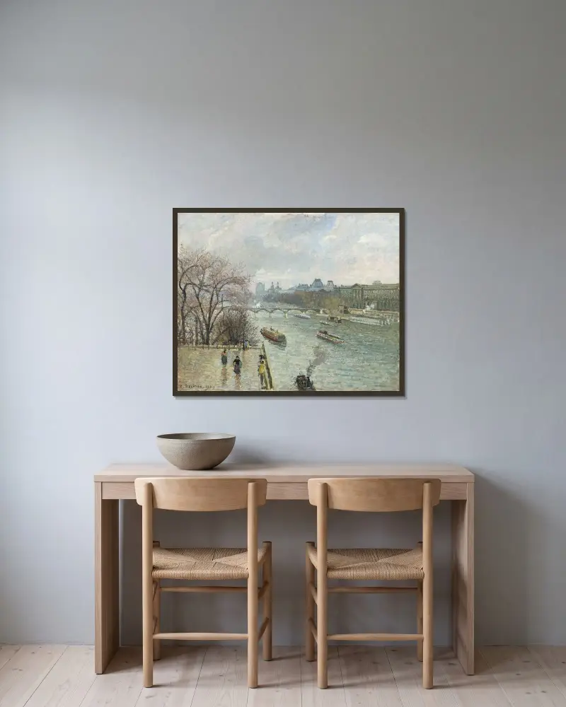 Der Louvre, nachmittags bei Regenwetter von Camille Pissarro gerahmt an einer Wand