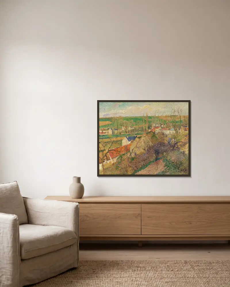 Vy över byn Osny av Camille Pissarro inramad på en vägg