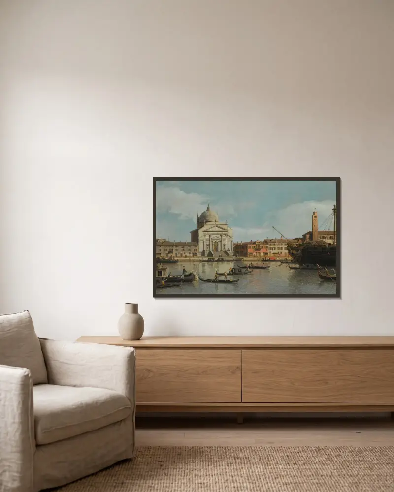 Venedig, vy mot kyrkorna Redentore och San Giacomo, med ett förtöjt örlogsfartyg, gondoler och pråmar av Canaletto inramad på en vägg