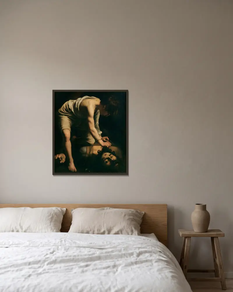 David und Goliath von Caravaggio gerahmt an einer Wand