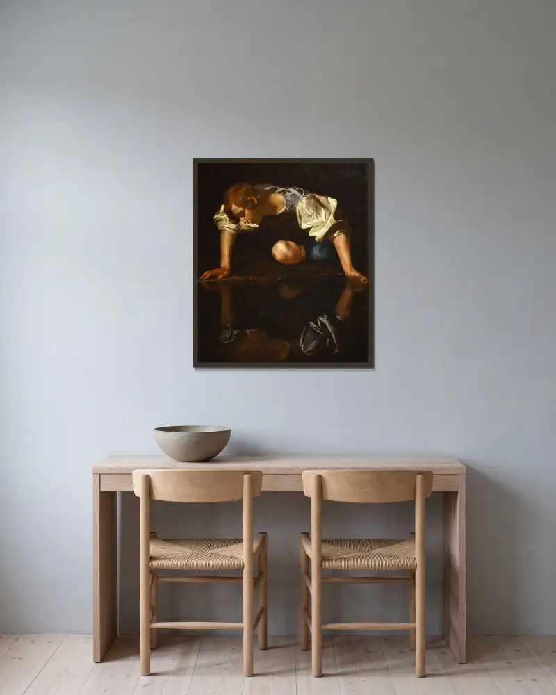 Narcissus av Caravaggio inramad på en vägg