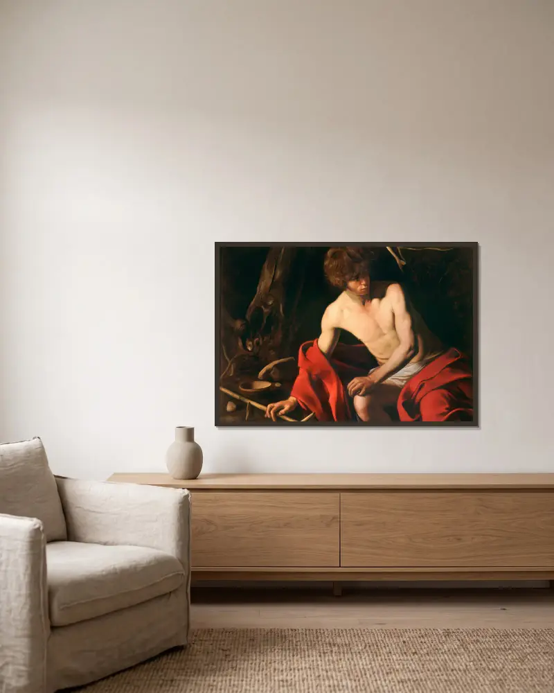Saint John the Baptist, 1603 av Caravaggio inramad på en vägg