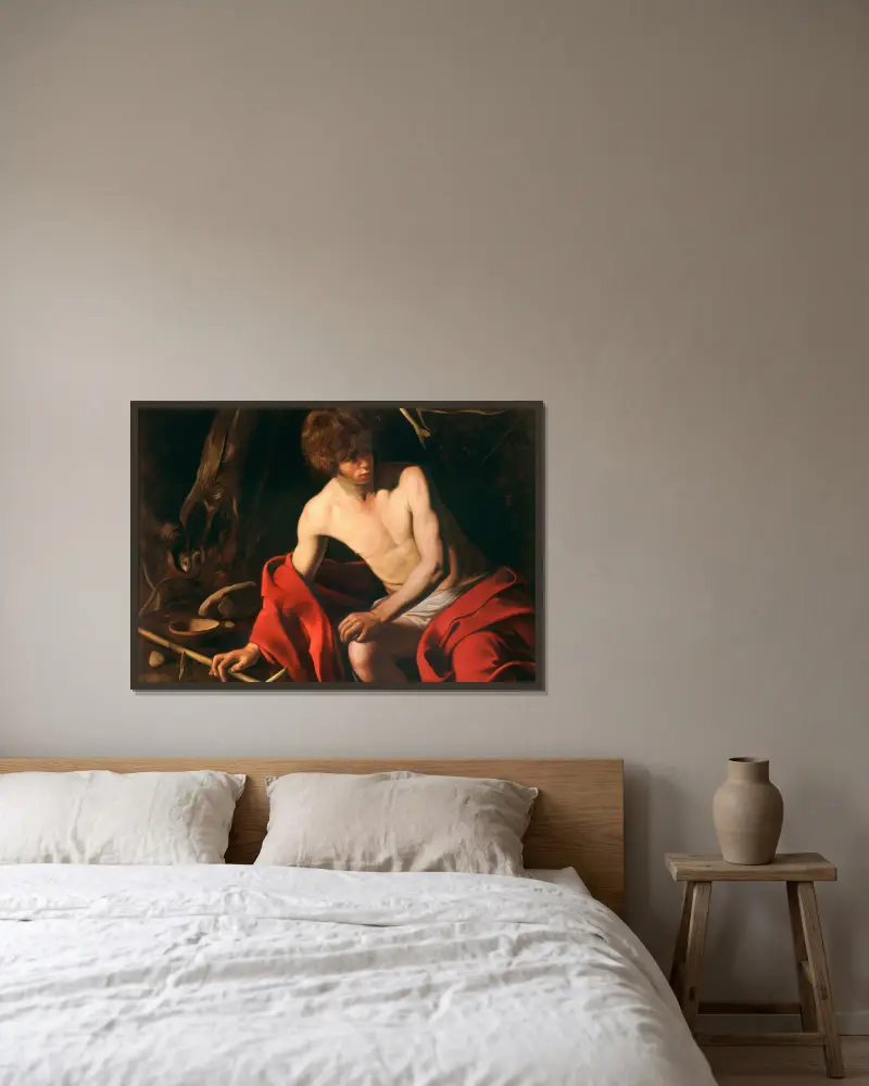 Saint John the Baptist, 1603 av Caravaggio inramad på en vägg