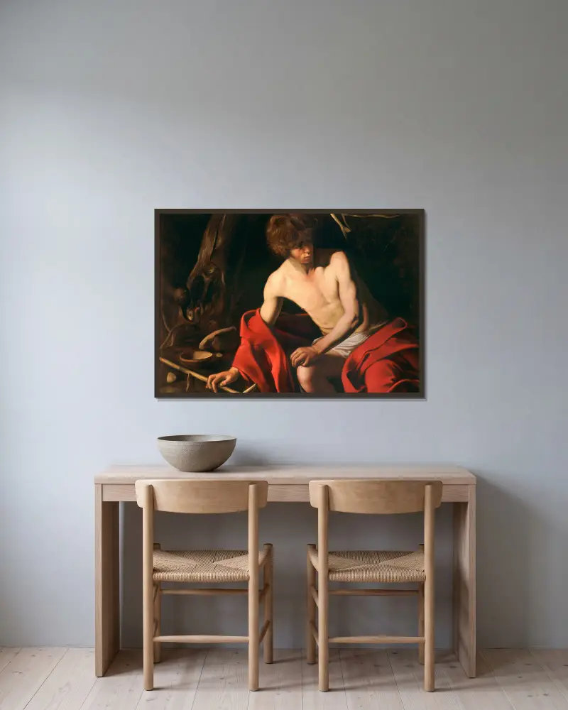Saint John the Baptist, 1603 av Caravaggio inramad på en vägg