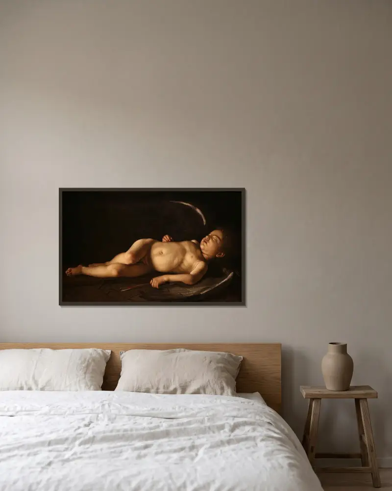 Spící Amor, Caravaggio v rámu na stěně