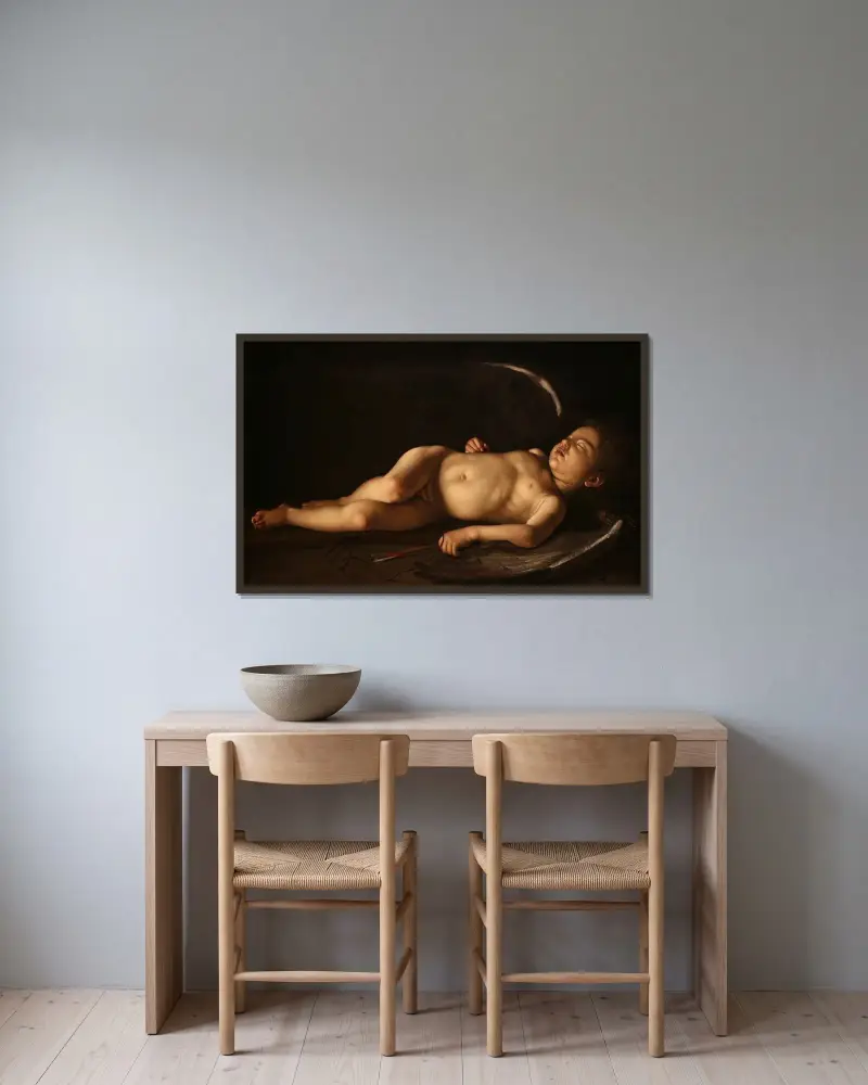 Spící Amor, Caravaggio v rámu na stěně
