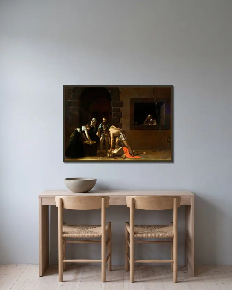 Johannes Döparens halshuggning av Caravaggio inramad på en vägg
