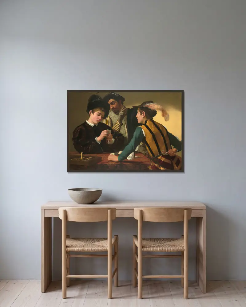 The Cardsharps av Caravaggio inramad på en vägg