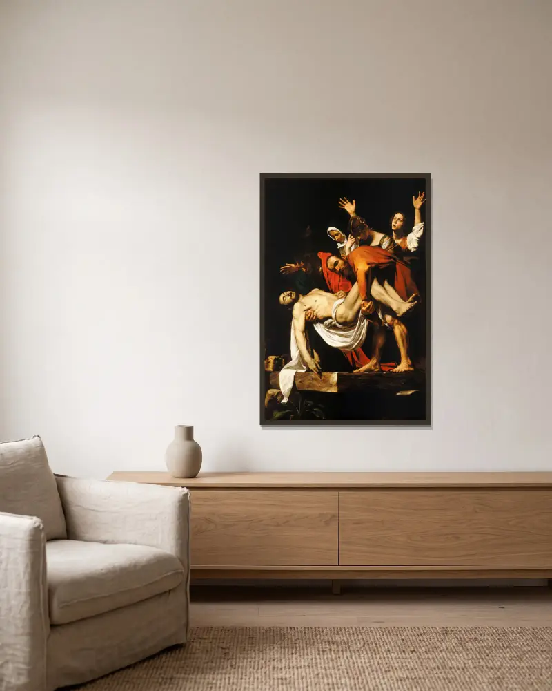 The Entombment of Christ av Caravaggio inramad på en vägg