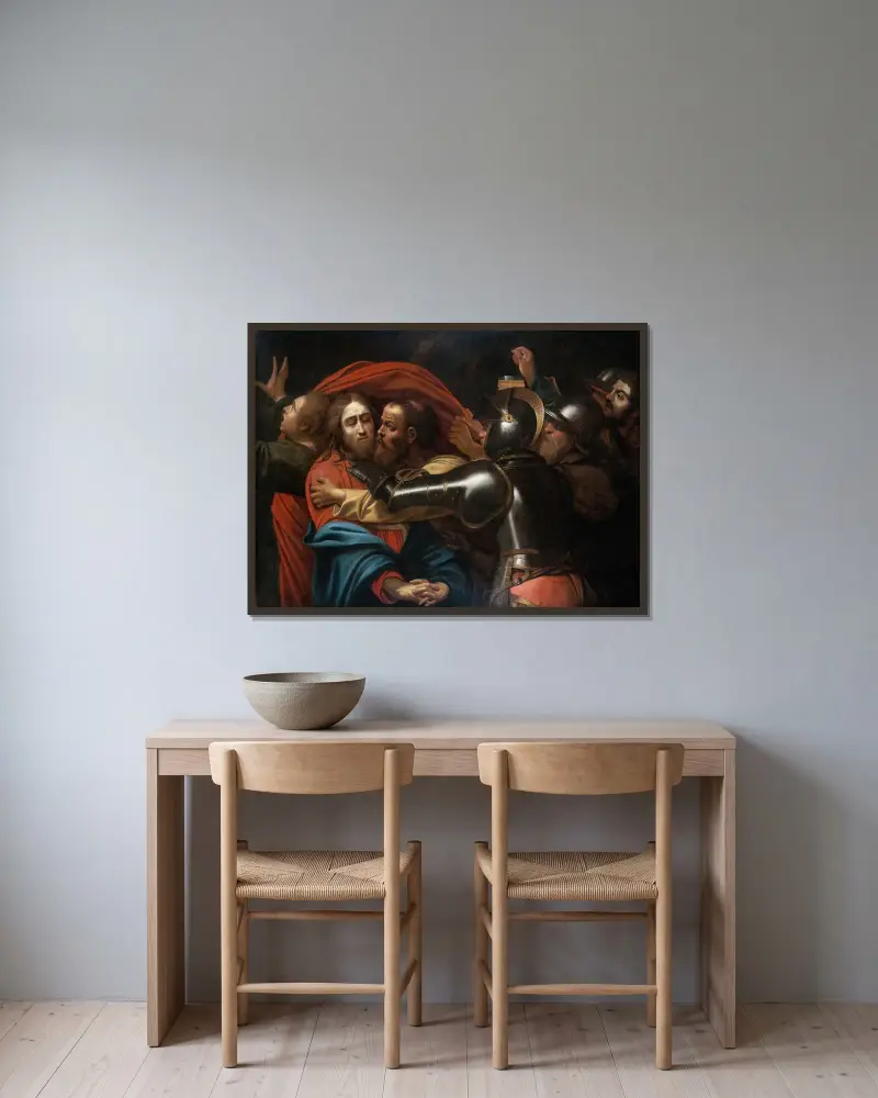 The Taking of Christ av Caravaggio inramad på en vägg