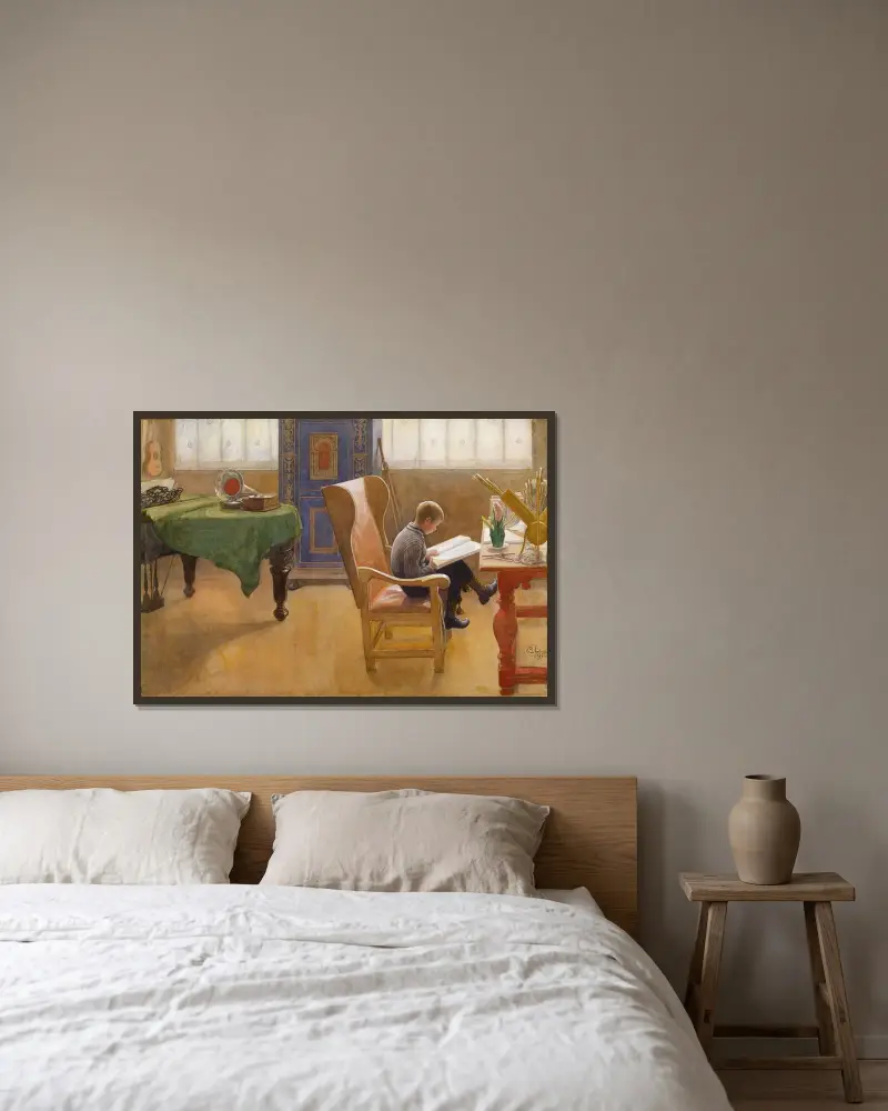 Esbjörn vid skrivbordet av Carl Larsson inramad på en vägg