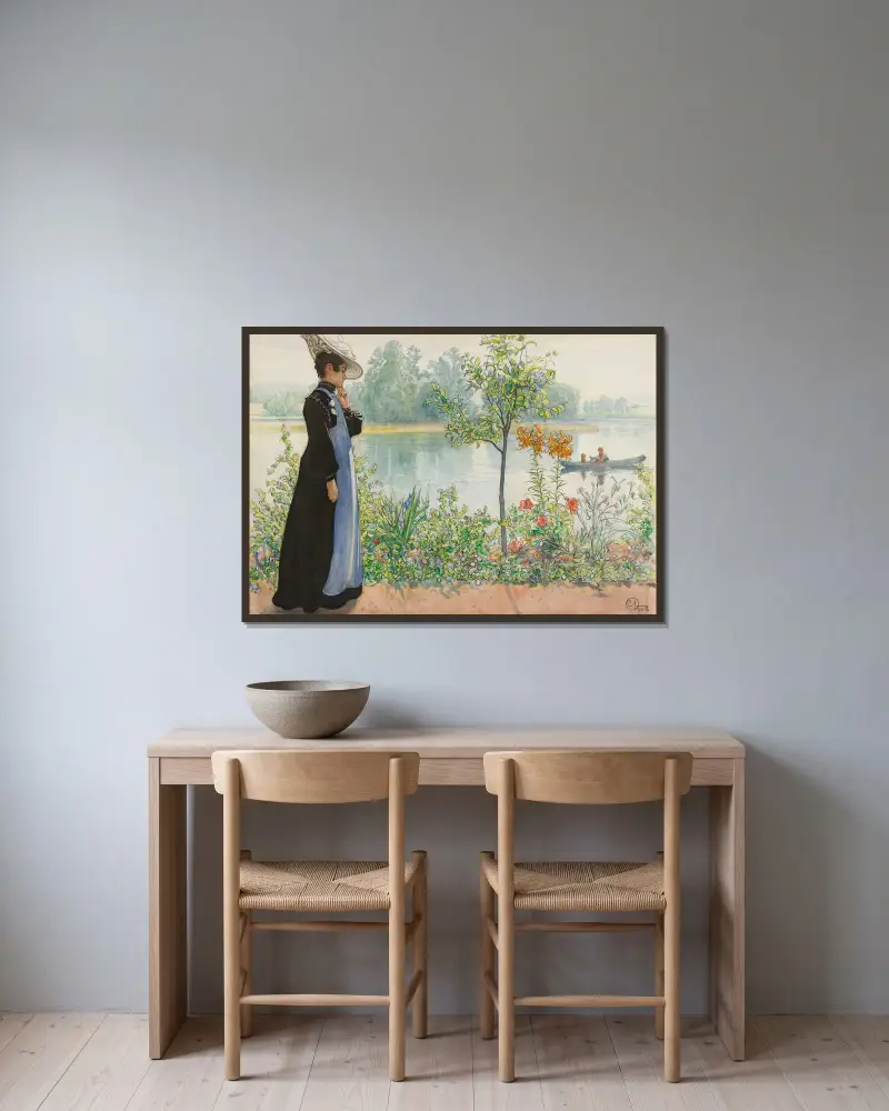 Karin vid stranden av Carl Larsson inramad på en vägg