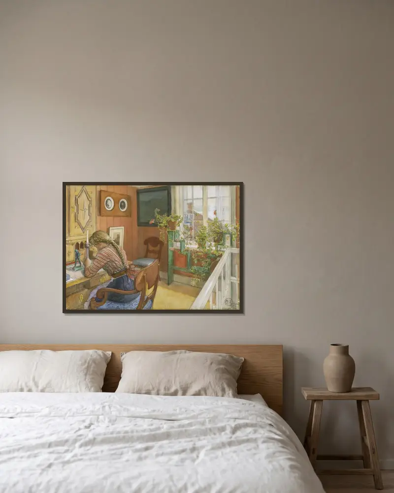 Brevskrivning av Carl Larsson inramad på en vägg