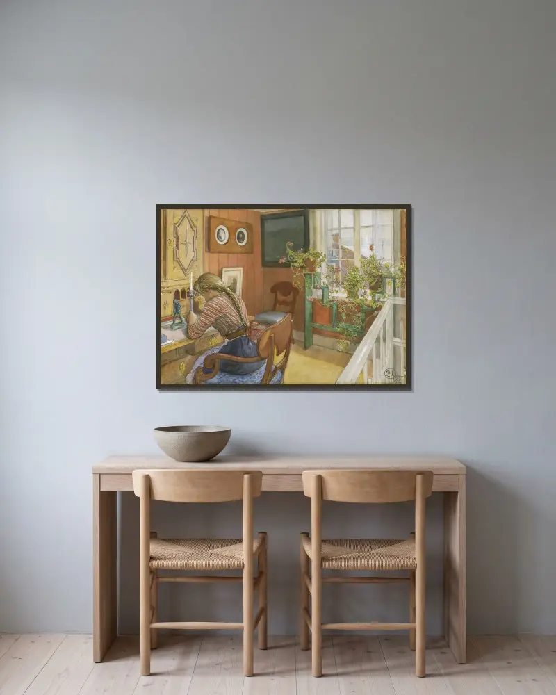 Brevskrivning av Carl Larsson inramad på en vägg