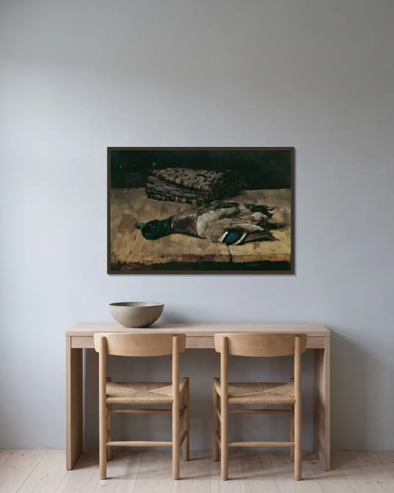 Stillleben mit Wildente und Jagdtasche I von Carl Schuch gerahmt an einer Wand