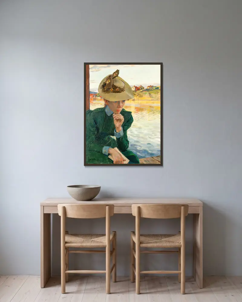 Scen från svenska västkusten av Carl Wilhelmson inramad på en vägg