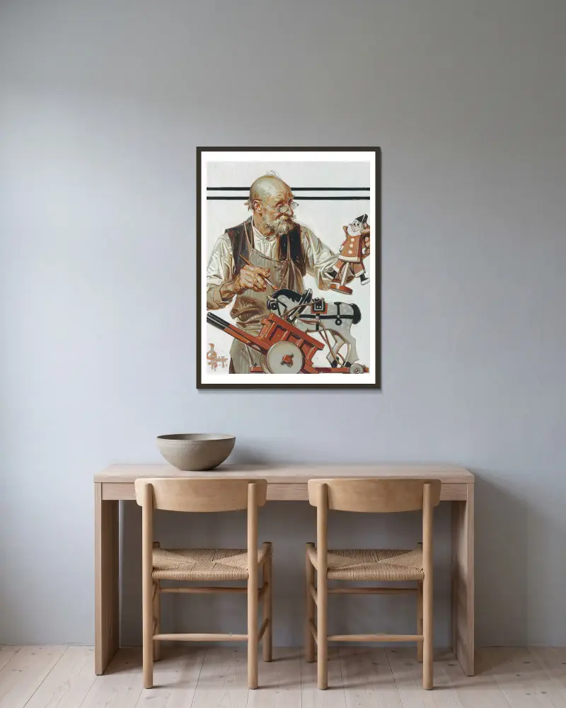 The Toymaker av Joseph Christian Leyendecker inramad på en vägg