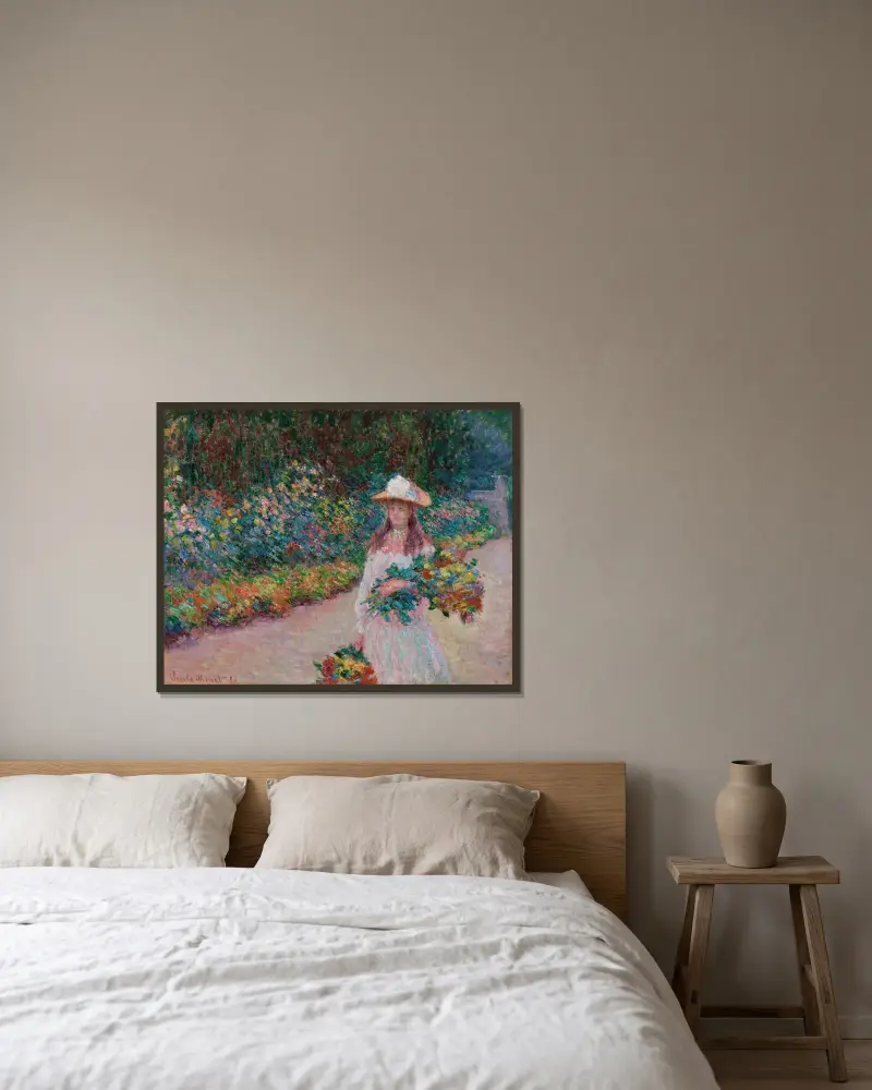 Jeune fille dans le jardin de Giverny av Claude Monet inramad på en vägg