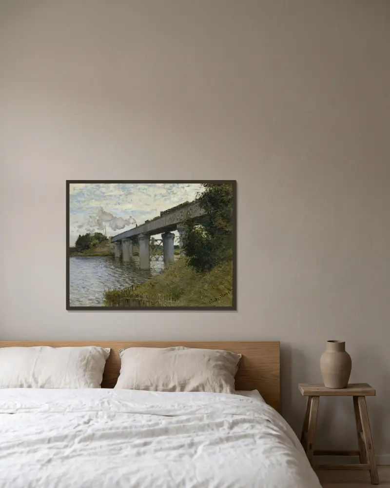 The Railroad bridge in Argenteuil av Claude Monet inramad på en vägg