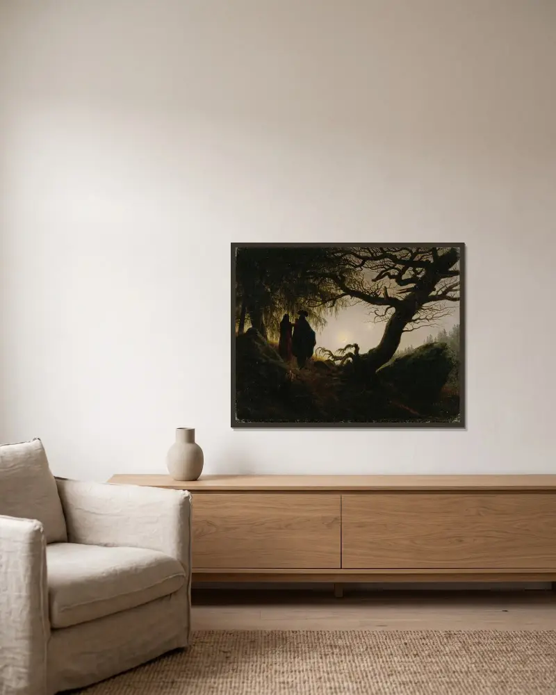 Man och kvinna betraktar månen av Caspar David Friedrich inramad på en vägg