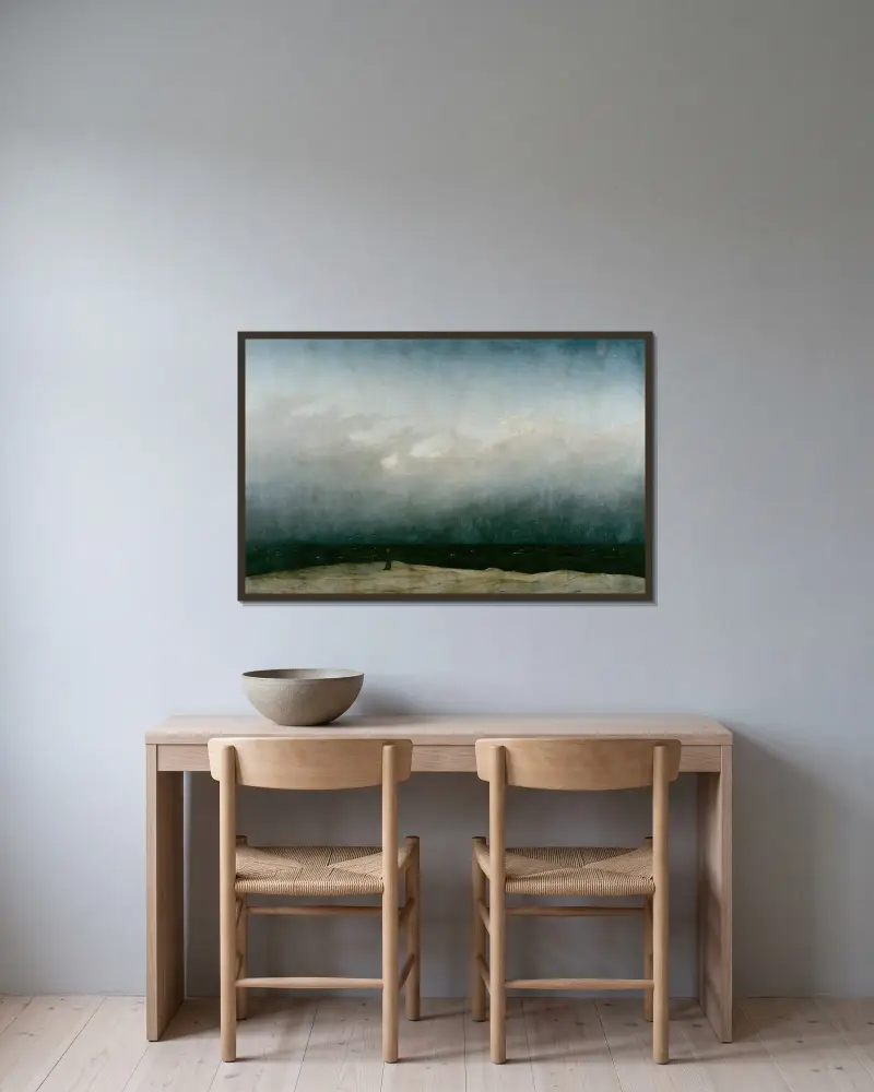 Munken vid havet av Caspar David Friedrich inramad på en vägg