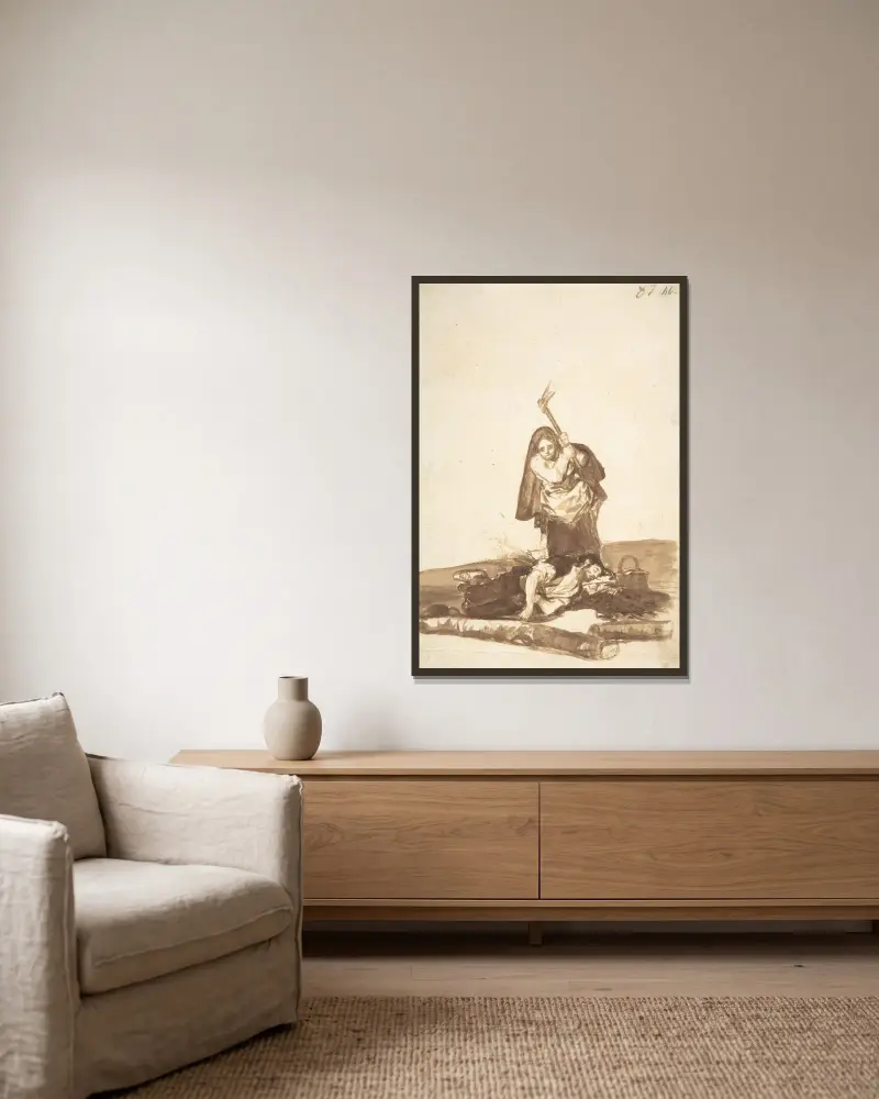Eine Frau, die einen schlafenden Mann mit einer Axt angreifen will von Francisco de Goya gerahmt an einer Wand