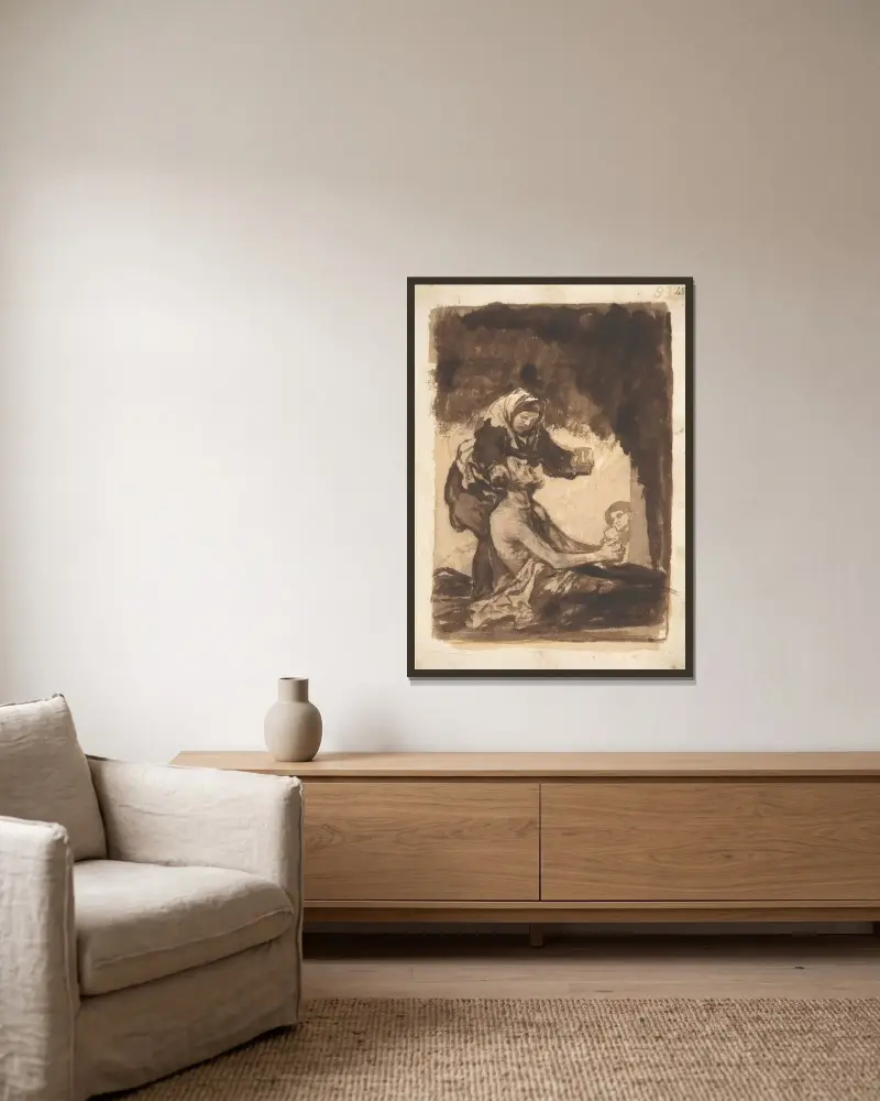 En kvinna som ger en mugg till en gammal man av Francisco de Goya inramad på en vägg