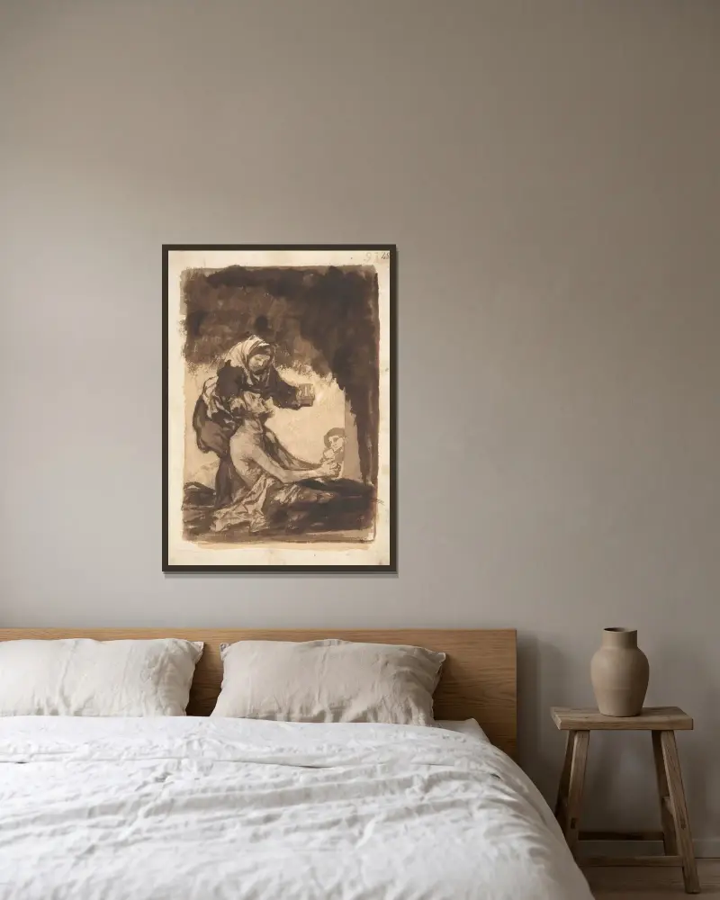 En kvinna som ger en mugg till en gammal man av Francisco de Goya inramad på en vägg