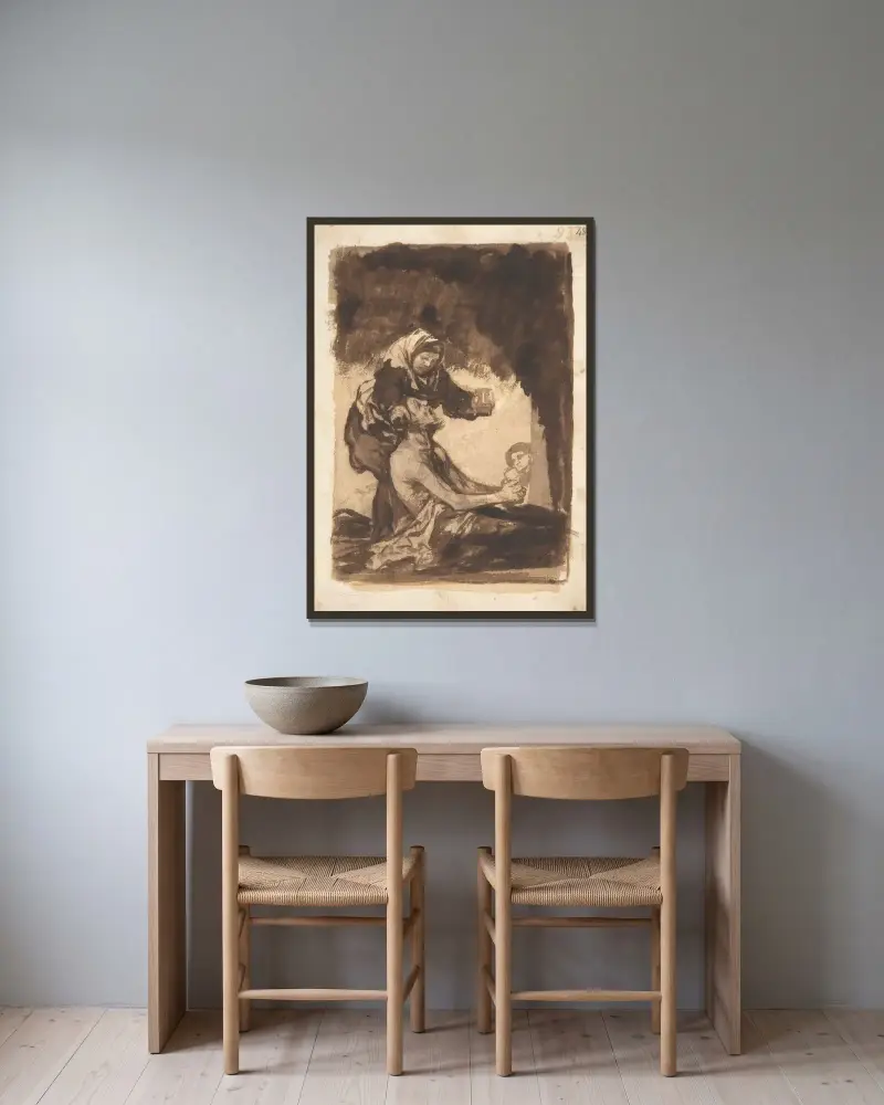 En kvinna som ger en mugg till en gammal man av Francisco de Goya inramad på en vägg