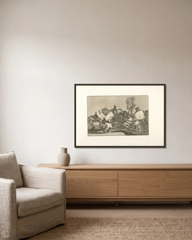 Narrenfest von Francisco de Goya gerahmt an einer Wand