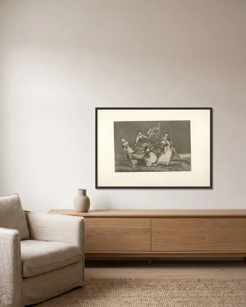 Kvinnlig dårskap av Francisco de Goya inramad på en vägg