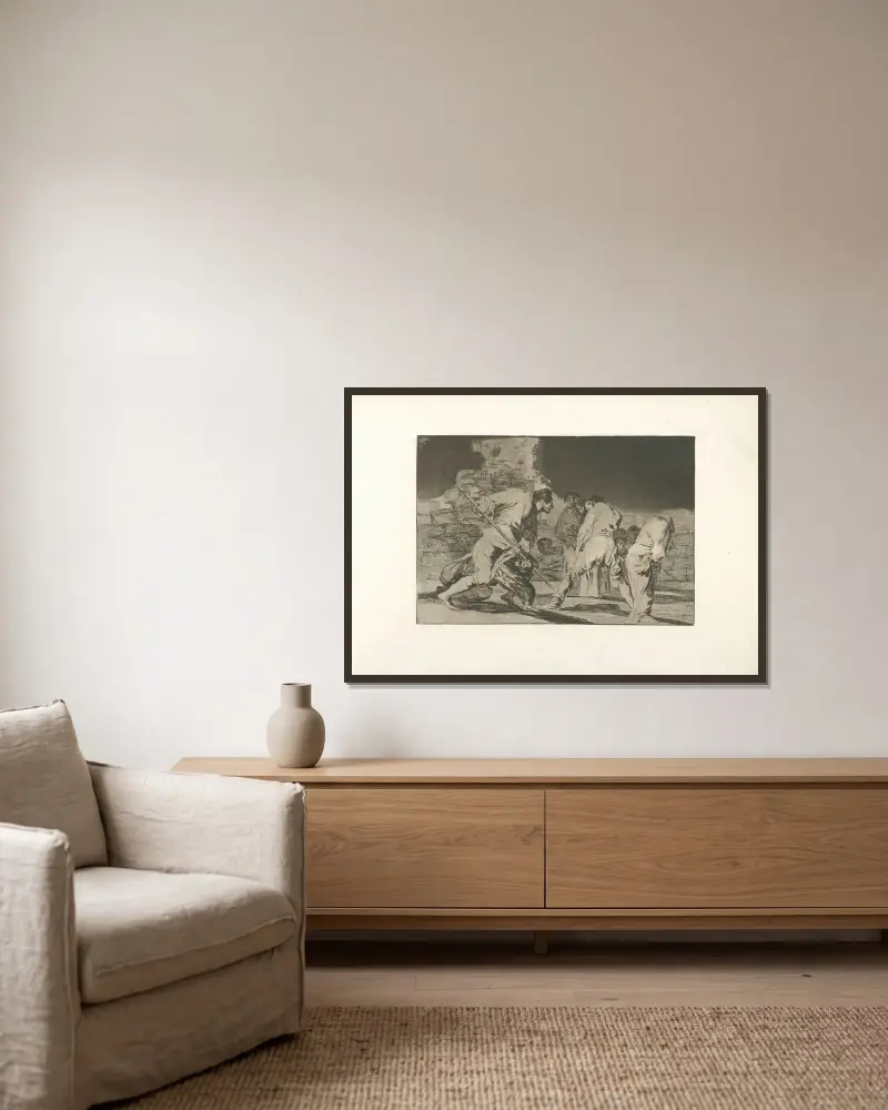Disparate furioso av Francisco de Goya inramad på en vägg