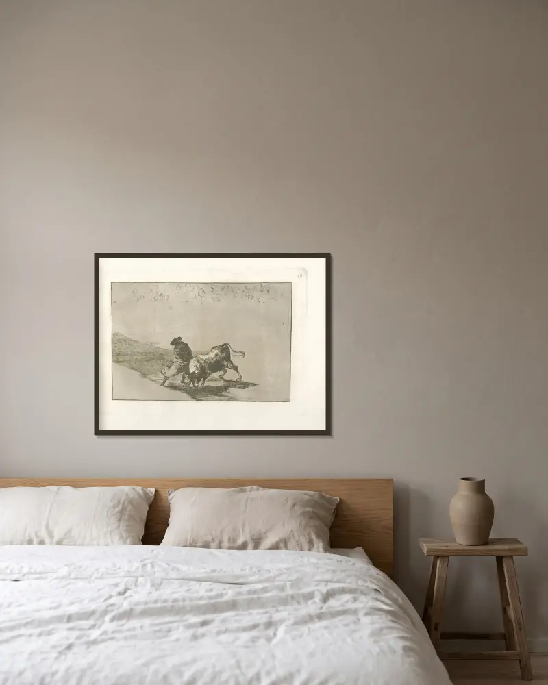Den ytterst skicklige studenten från Falces, maskerad, lurar tjuren med sina vrickningar av Francisco de Goya inramad på en vägg