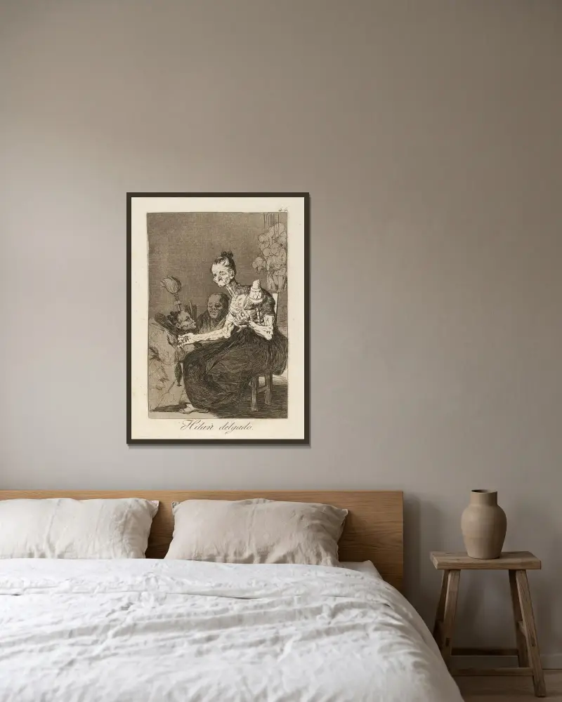 Hilan delgado. (Sie spinnen fein.) von Francisco de Goya gerahmt an einer Wand