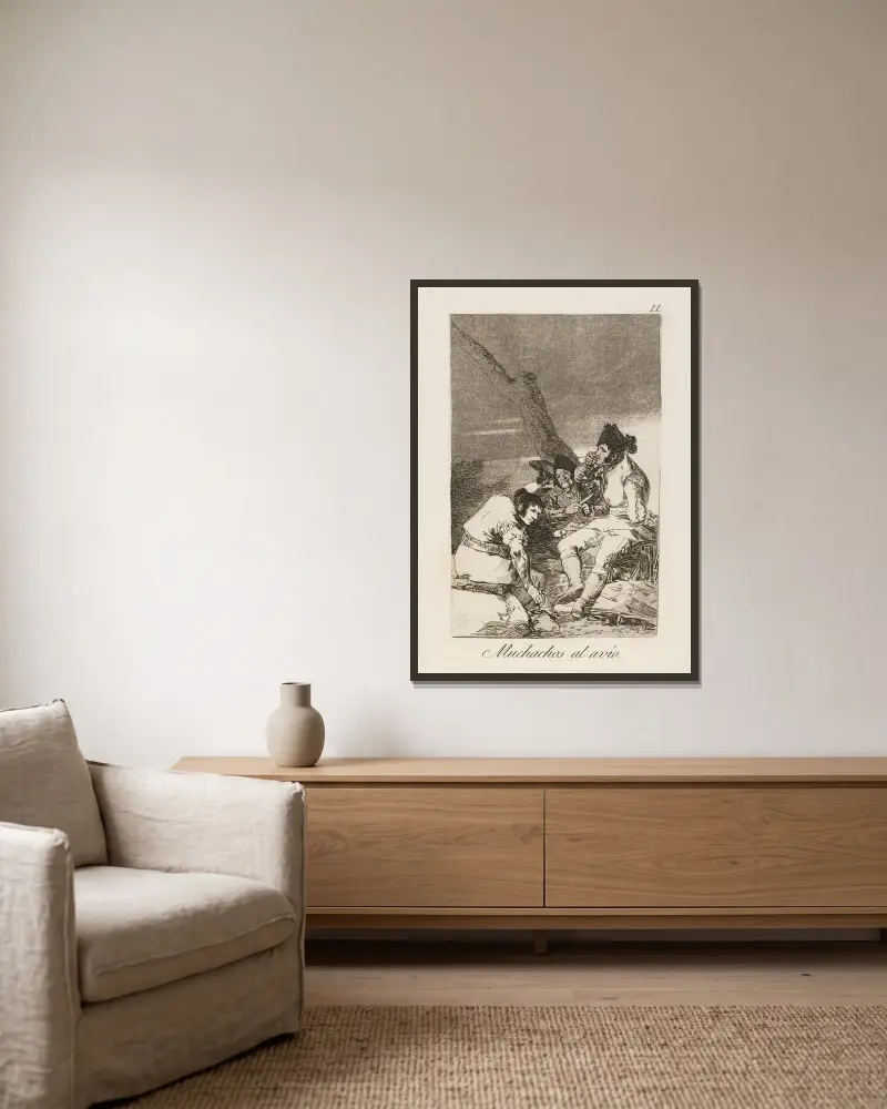 Muchachos al avío. (Knaben machen sich bereit.) von Francisco de Goya gerahmt an einer Wand