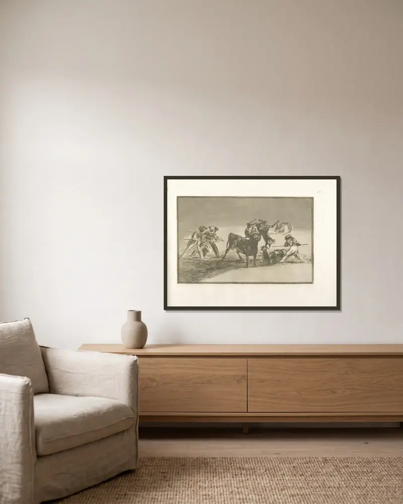 Morernas palenque gjord med åsnor för att försvara sig mot den eldade tjuren av Francisco de Goya inramad på en vägg