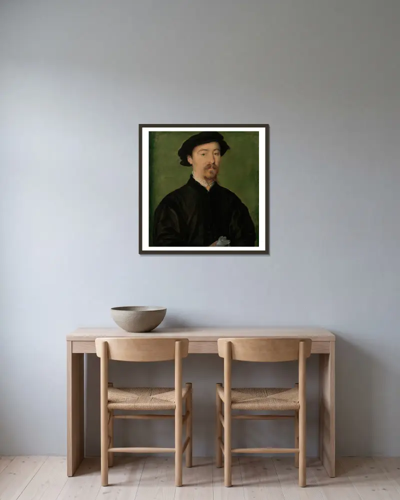 Porträtt av en man med handskar, 1540 av Corneille de Lyon inramad på en vägg